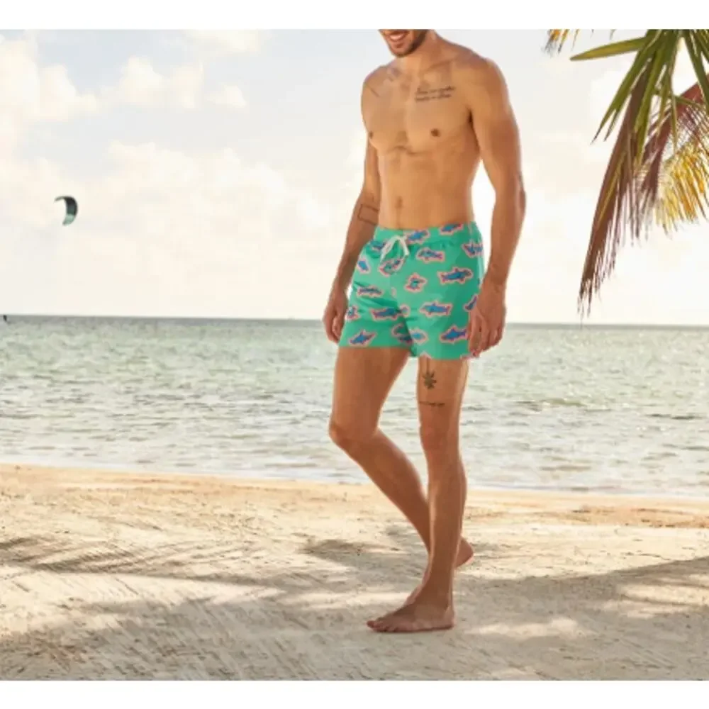 chubbies Teal Swim Trunks with Blue and Pink Starfish Print